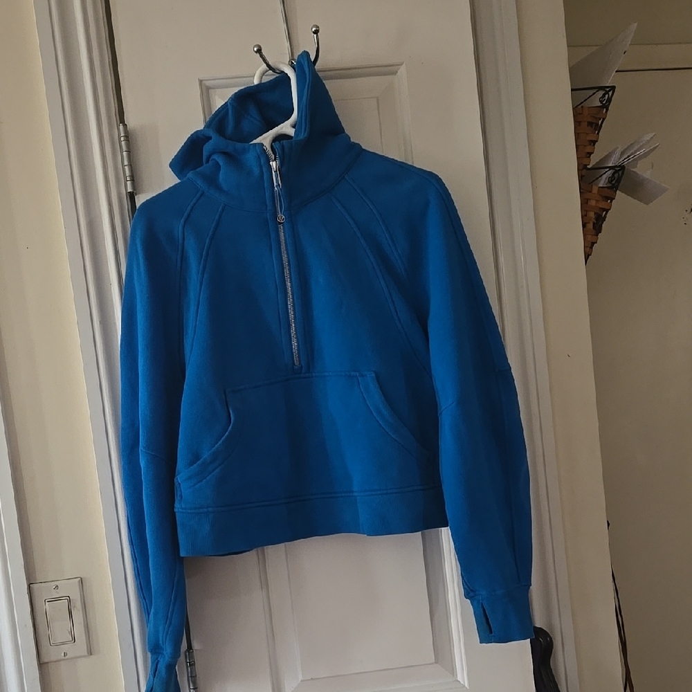 Blue Hoodie with Front Pocket..the tag says M/L feels more on the L side